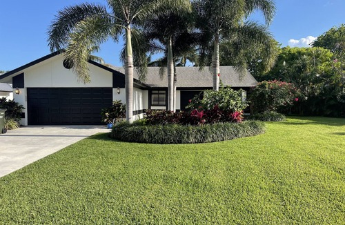 Lake Ida Shores House | Heated Saltwater Pool! Beautiful Activity Filled Three BR Home Downtown Delray