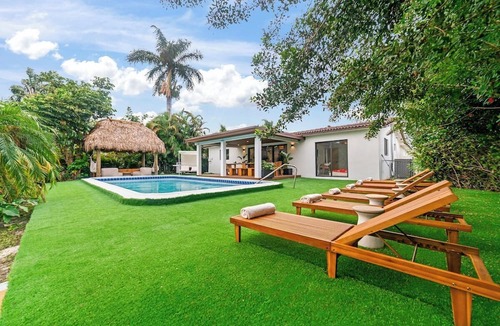 Park East Villa | Hermes inspired villa | waterfront | pool | tiki