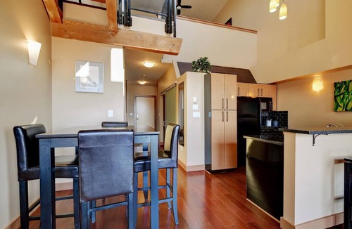 Downtown Victoria Condo | High Ceilings with Loft and Private Patio