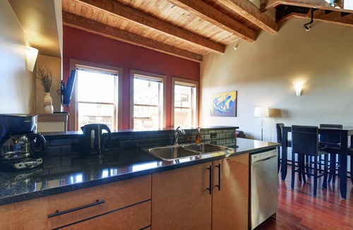 Downtown Victoria Condo | High Ceilings with Loft and Private Patio