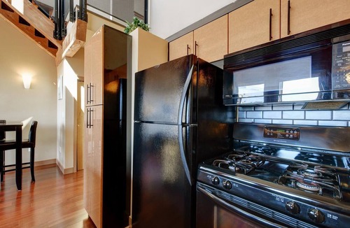 Downtown Victoria Condo | High Ceilings with Loft and Private Patio