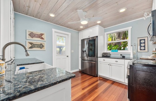 Stuart House | Historic 1935 home directly on the River! 167' New Dock, Walk to Downtown, Pool