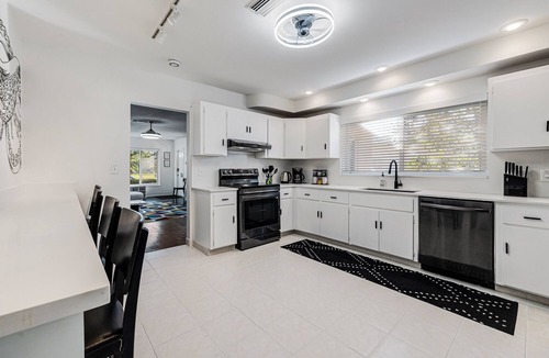 Downtown Hollywood House | Historic bungalow, heated pool, cabana, arcade, on park, beach 5 min, dogs ok.