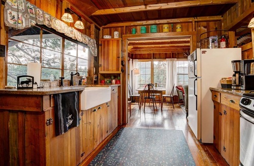 Estes Park House | Historic Cabin with a Mix of Antique and Modern; Croquet Court to Try Your Skill