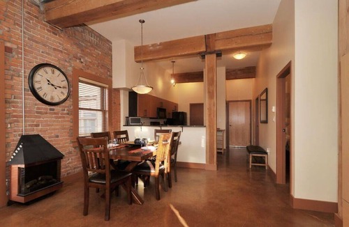 Downtown Victoria Condo | Historic Loft w/Exposed Brick & Timber Beams