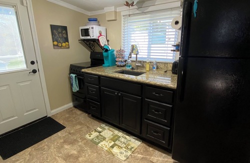 Russells Point Cottage | Historic Tiny Cottage just a short walk to the lake. Pet Friendly!
