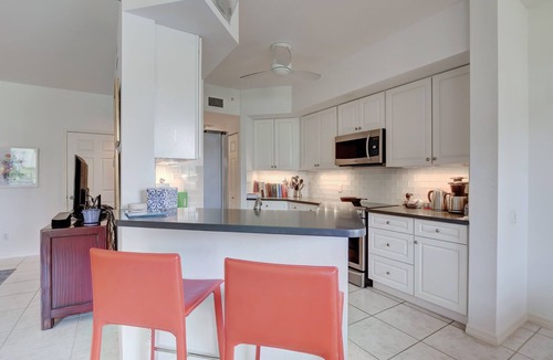 Pelican Bay Condo | Immaculate 2BR waterview condo in favored Pelican Bay !