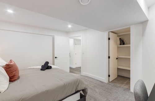 Chestermere Apartment | "Inky & Rose" Stylish Two Bedroom Lower Suite