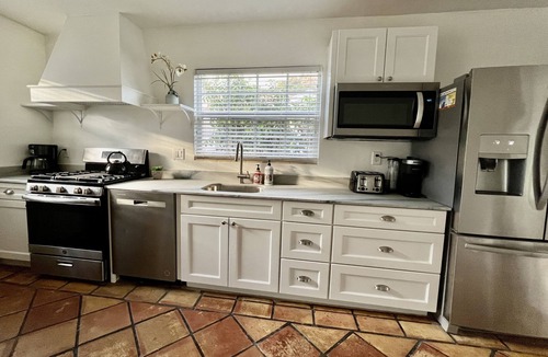 Lake Worth House | KEY LIME COTTAGE WITH SWIMMING POOL located near Beaches and downtown.