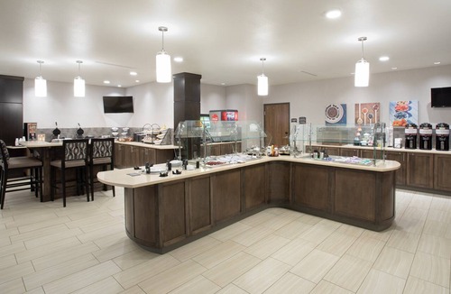 Rapid City Apartment | King Suite. Free Breakfast. Pool & Hot Tub. Great for Business Travelers!
