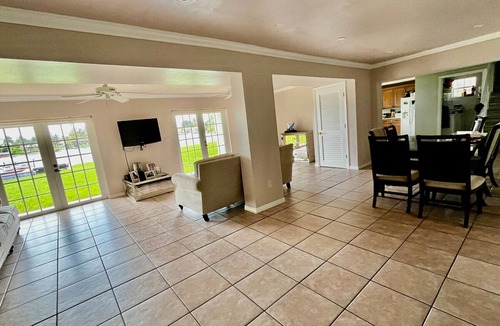 Miami Gardens House | Lake front 3 bed house with sunset views and hot tub, ski in your own back yard