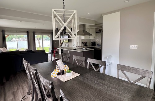 Lochmere House | Lakefront 3-bedroom Duplex on Lake Winnisquam, docks, Beach, WiFi, AC. B2A