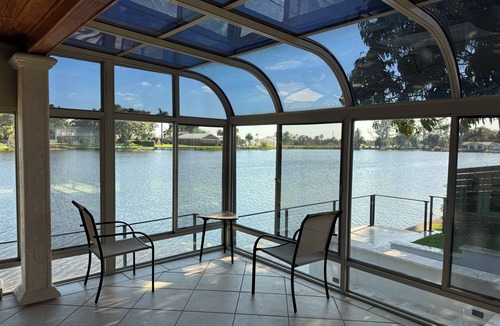 Miami Lakes House | Lakefront 5-bedroom, 4 bathroom home in tranquil Miami Lakes with Fitness room.