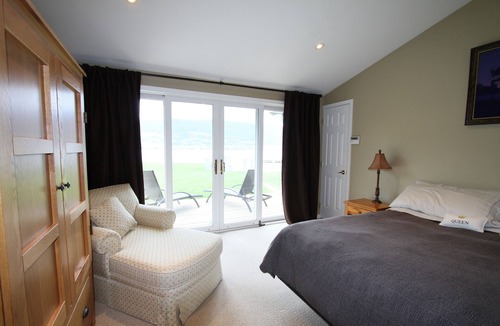 Okanagan-Similkameen House | Lakefront family oriented property -- flat, fully fenced 177 ft. beach front