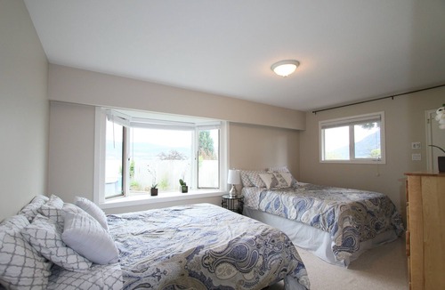 Okanagan-Similkameen House | Lakefront family oriented property -- flat, fully fenced 177 ft. beach front