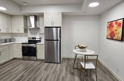 Airdrie Apartment | Lanark Airdrie home near airport, CrossIron Mills, shopping & dining.