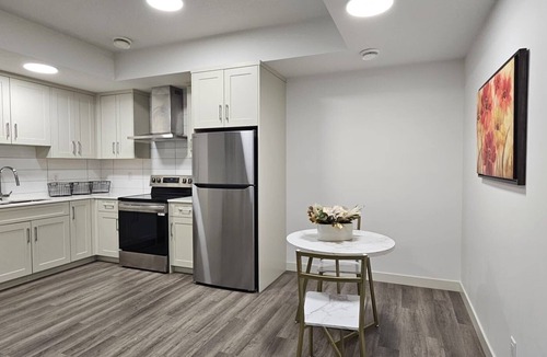 Airdrie Apartment | Lanark Airdrie home near airport, CrossIron Mills, shopping & dining.