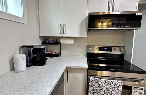 Saskatoon House | LUXLOFT SUITE. Cozy 2-bedroom basement suite in a serene location.