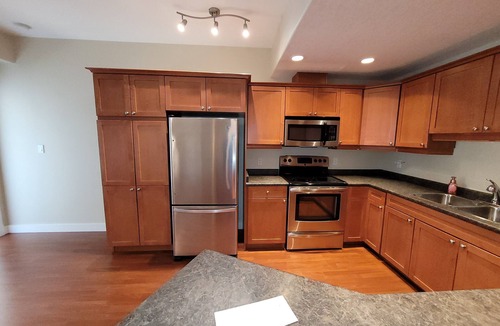 Division No. 11 Apartment | Luxury top floor apartment style condo with balcony. 25 minutes from EIA.