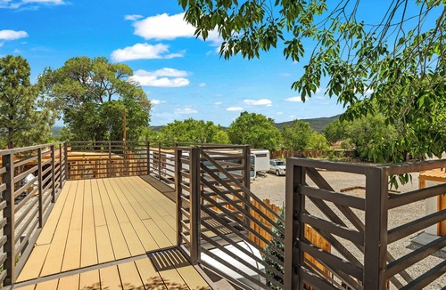 Taos Cabin | LUXX Space Cabin Tiny House with rooftop deck, private fenced patio.