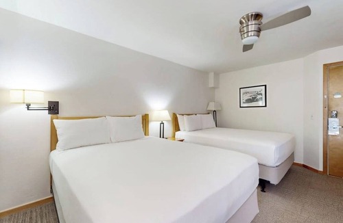 West End Cabin | Main Street studio - pool & hot tub - walk to lifts, dog-friendly, balcony
