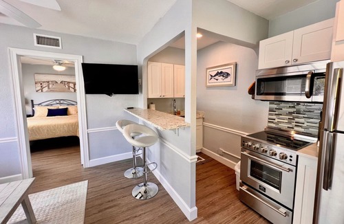 Parrot Cove Apartment | Modern 1 bedroom villa just five minutes to the beach!