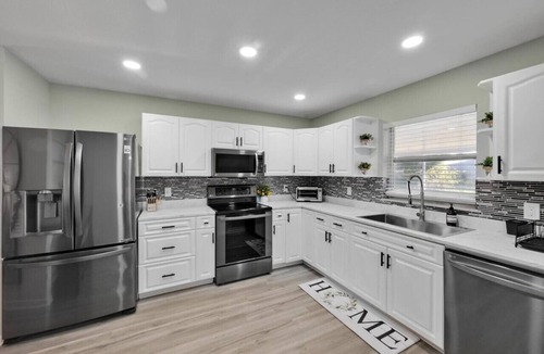 Port Saint Lucie House | Modern 3BR Home | Game Room, Arcades & Huge Patio for Family Fun