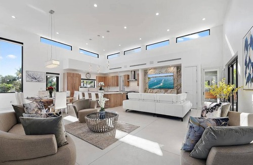 College Park House | Modern Luxe Lake Worth Beach Oasis w/Rooftop Terrace, Heated Pool+Spa, Gym Space