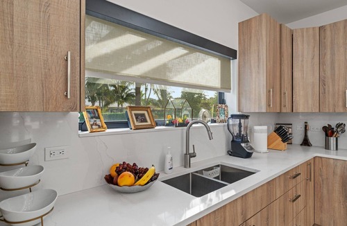 College Park House | Modern Luxe Lake Worth Beach Oasis w/Rooftop Terrace, Heated Pool+Spa, Gym Space