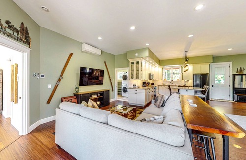 North Creek House | Nature-nestled lodge with wood stove - steps away from skiing, hiking, downtown