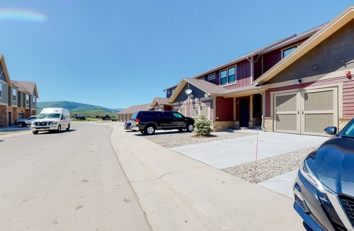 Grand Elk Ranch House | New-build townhome with panoramic mountain views & gas fireplace