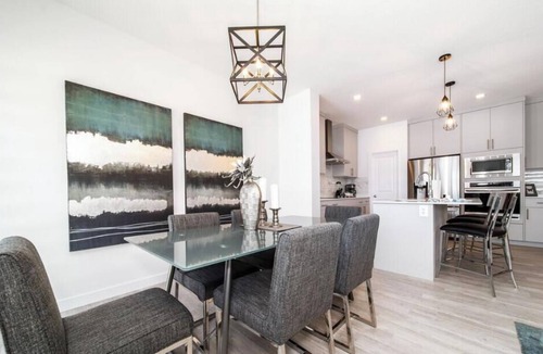 Southwest Edmonton Apartment | New - Chic Modern Home - King bed - Foosball - Sleeps 8!
