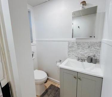 Laconia Apartment | NEW! Cozy and Modern unit with Hot tub