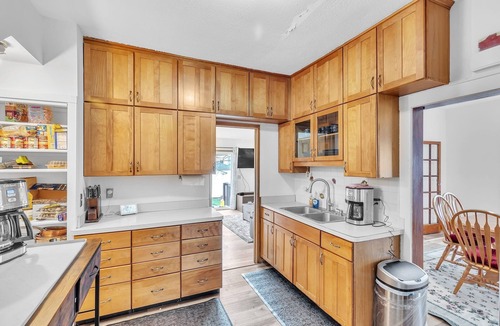 Garfield Heights House | NEW! Cozy Getaway with Hot Tub, Patio & Fenced Yard