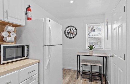 Laconia Apartment | NEW! Cozy & Modern unit w/Private HOT TUB and Backyard