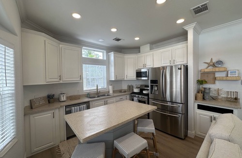 Juno Beach House | New! Recently updated, cozy bungalow across from the Juno Beach Pier.