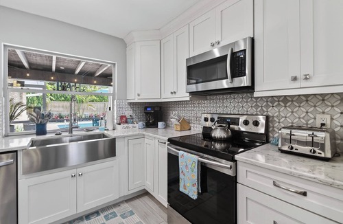 Palm Beach Gardens House | Palm Paradise | Heated Pool | PGA | Beaches | Waterpark | Roger Dean