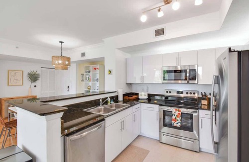 Downtown West Palm Beach Apartment | Palm Penthouse - Bright Designer Penthouse in the Heart of CityPlace