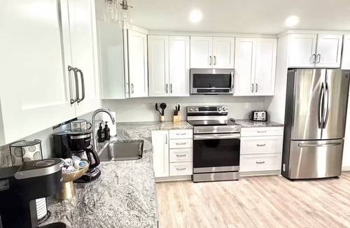 Indian Harbour Beach House | Palm Villa - 4 Bed, 2.5 Bath, Heated Pool, Hot Tub, Blocks to Beach, Sleeps 10+