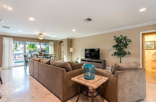 Garden Isles House | Palm Villa: New Remodel/Waterfront/Salt Water Pool!