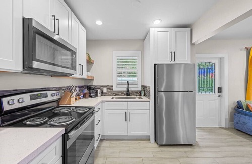 Greenacres House | PalmParadise: 5BR Family&Pet Fun, HeatedPool&Games