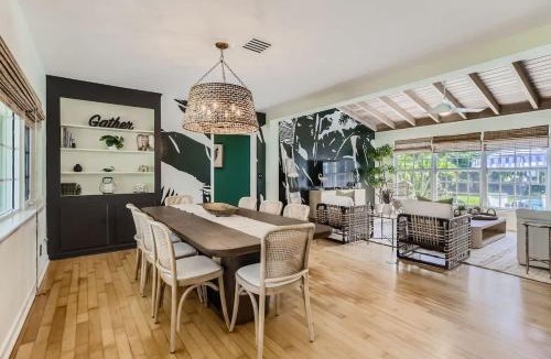 Parrot Cove House | Peacock Oasis - Retro Vibes and Poolside Lounging in Parrot Cove