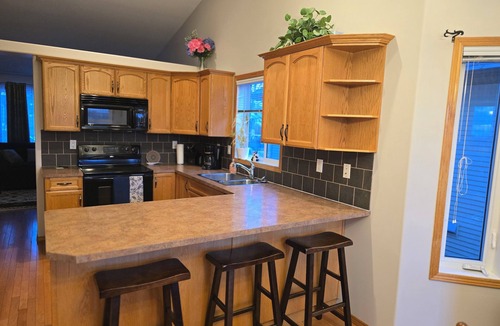 Red Deer House | Pet friendly 2 bedroom and full bathroom with soaker tub close to Westerner.