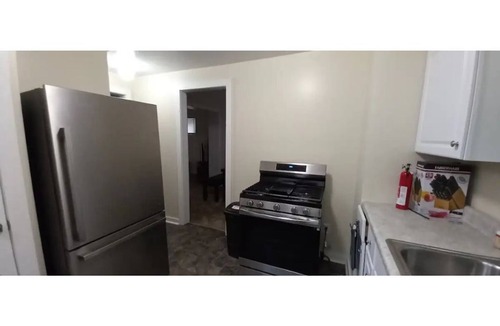 Akron House | Pet friendly home near Cuyahoga and Portage Lakes sleeps 10, 3 decks & fire pit.