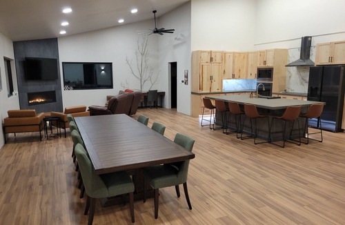 Centennial House | Pine & Peak Lodge in Centennial, WY Patio Seating & Game Area -No cleaning fee-