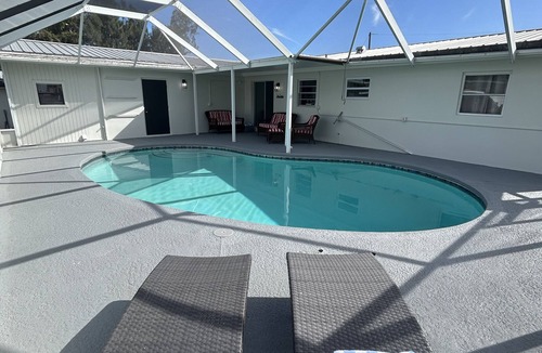 Taylor Creek House | Pool house with lake access