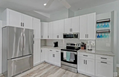 Royal Palm Beach House | Private Home with Oasis Backyard w/Pool, BBQ, King Beds