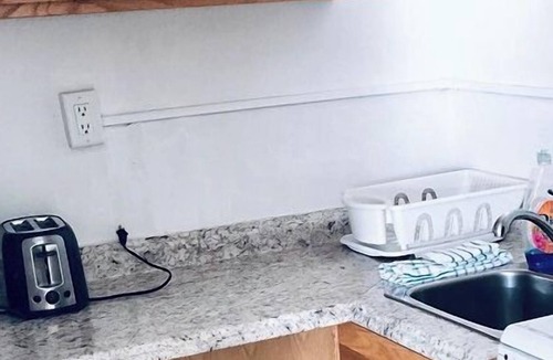 Pompano Beach Hotel | Queen Studio-Full Kitchen,Tiki Area, Overlooking the Beach