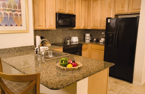 Survey Creek Resort | Relax at our Palm Tree secluded Resort with a poolside bar and waterslide