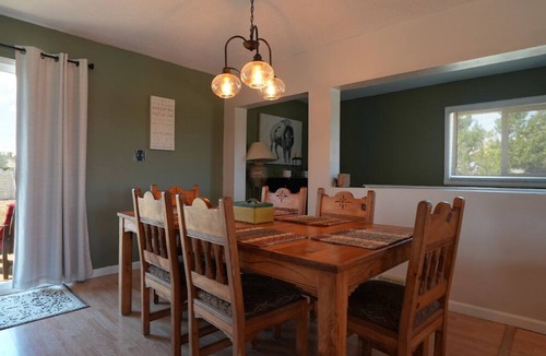 Casper House | Relax at this riverfront getaway with direct access to fishing, kayaking, and peaceful waterfront views. End your day around the fire pit, grill dinner outdoors, and enjoy a quiet escape surrounded by nature.